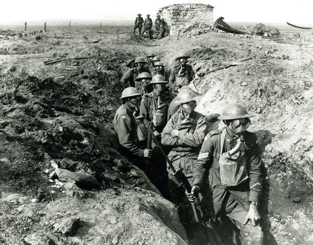 Soldiers protect themselves from gas